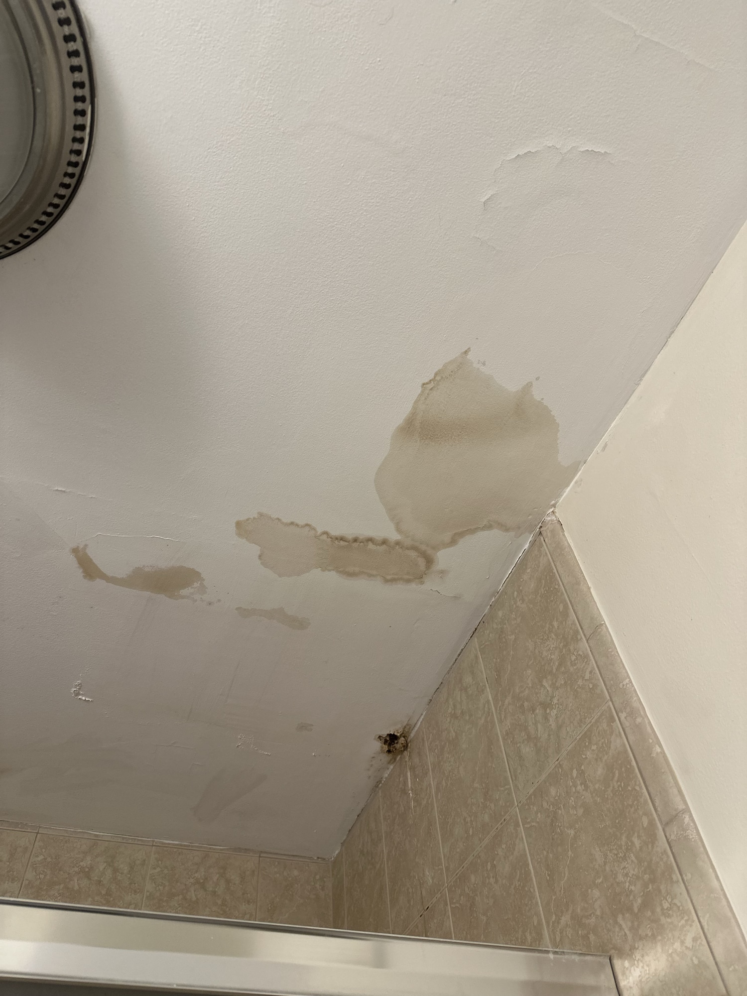 Water leak on ceiling of old bathroom ceiling pipe issue, Hidden Plumbing Leak.