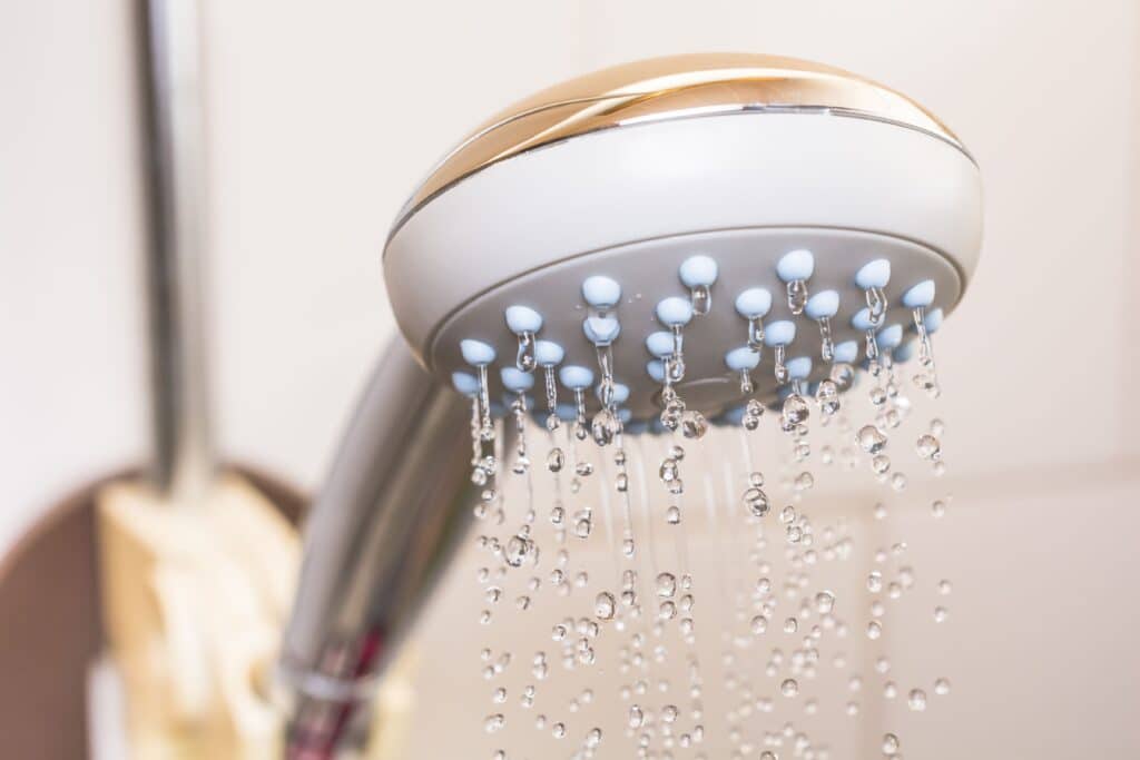 Decrease in water pressure shower head, Shared Residential Water Lines.
