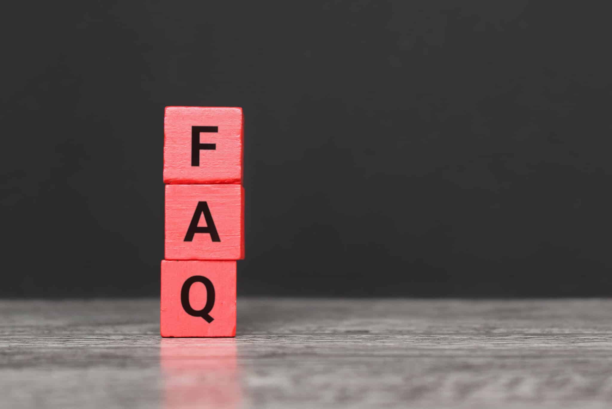 Wooden cubes with text FAQ. Maintaining Your Sump Pump.