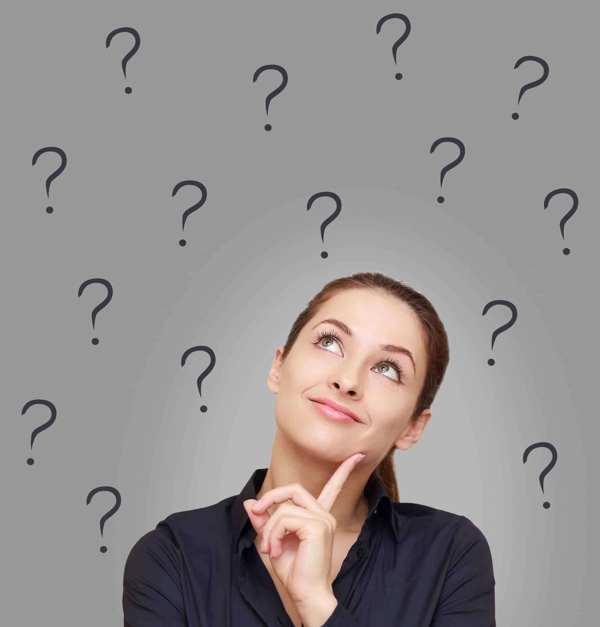 Thinking woman looking up on many questions mark, Sewer Cleanout Location.