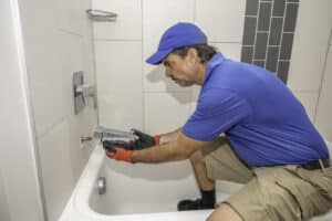 Tub spout diverter issues that reduce shower flow.